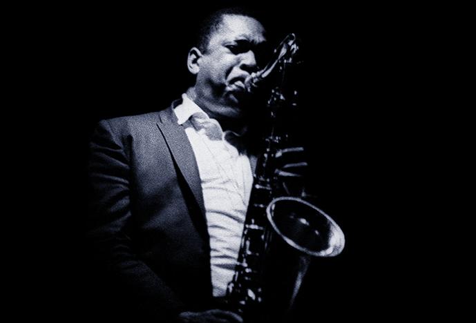 Portrait of John Coltrane playing the saxophone