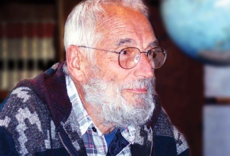 man with glasses, white hair, and a white beard