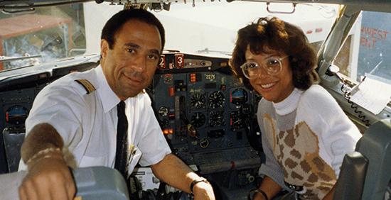 Tamara and Woody Fountain in an airplane cockpit