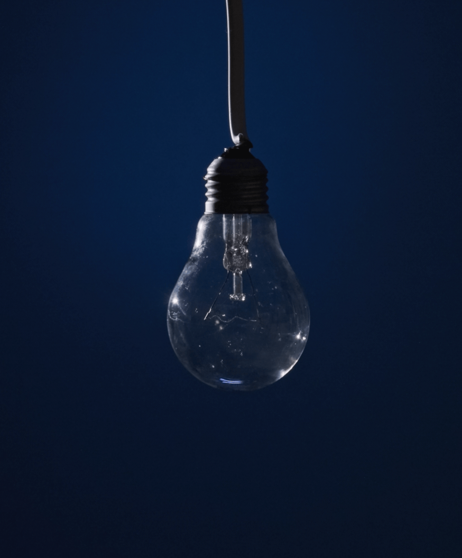 A GIF shows a lightbulb turned off, flickering to on. The light is blue.