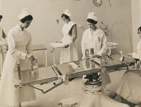nurses in operating room mid-20th century