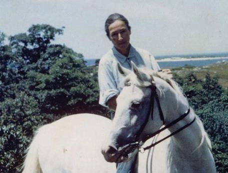 Anne Pappenheimer Forbes astride a horse
