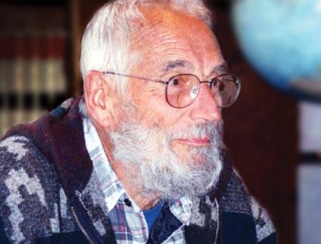 man with glasses, white hair, and a white beard