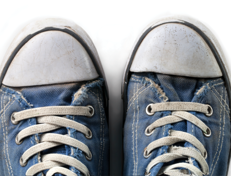Two blue sneakers with white tips side-by-side
