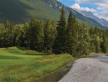 green golf course in the mountains