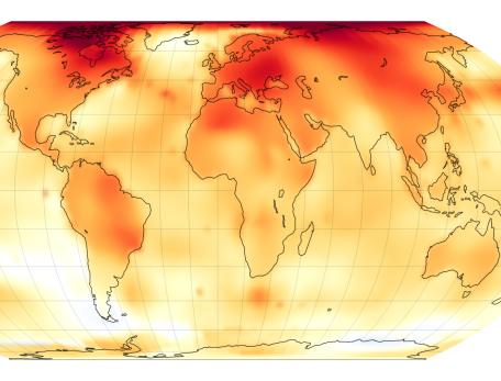 A map of the globe with many areas yellow, orange, and red, showing where surface temperatures were higher than 20th-century baselines.