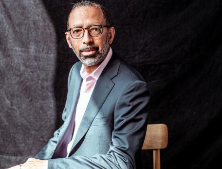 Levi Garraway sitting against a gray background.