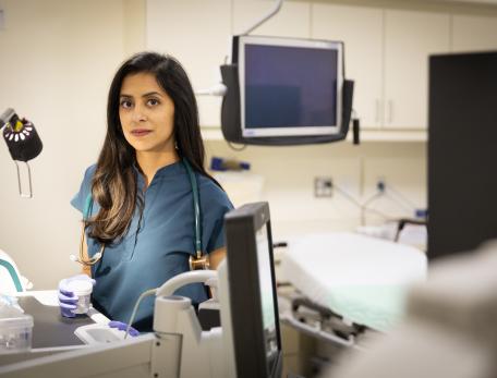 Trisha Pasricha stands in a hospital room