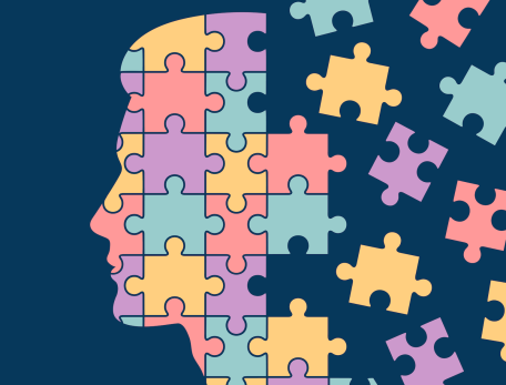 An illustration of a profile silhouette of a human head composed of interlocking pastel-colored puzzle pieces. Several pieces are breaking away from the back of the head and floating into a dark blue background.