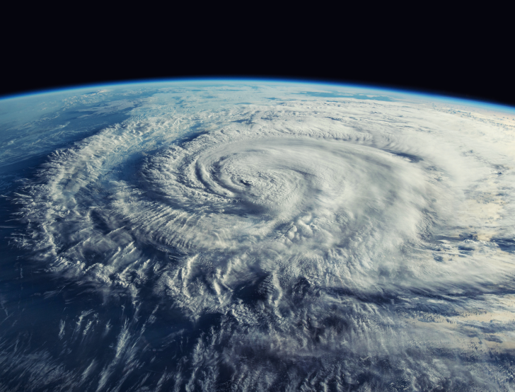 A satellite image shows a hurricane on Earth from space