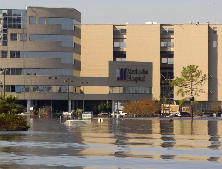 A hospital is partially submerged in floodwater after a natural disaster.