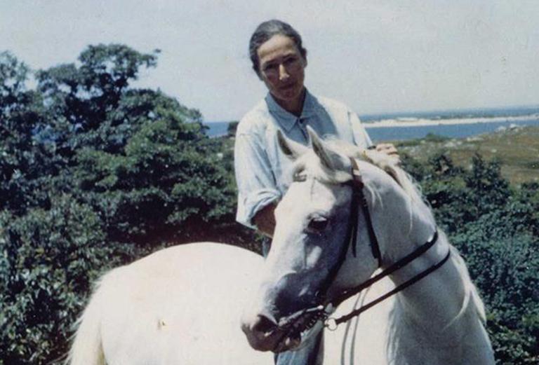 Anne Pappenheimer Forbes astride a horse