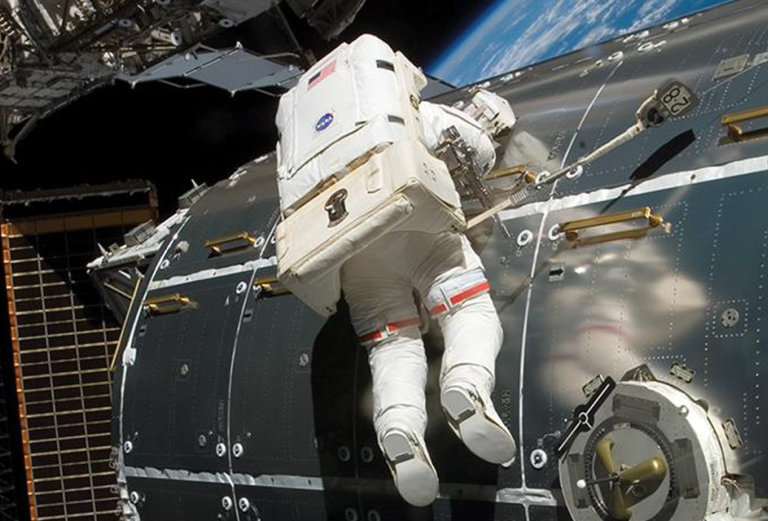 Astronaut outside a spaceship