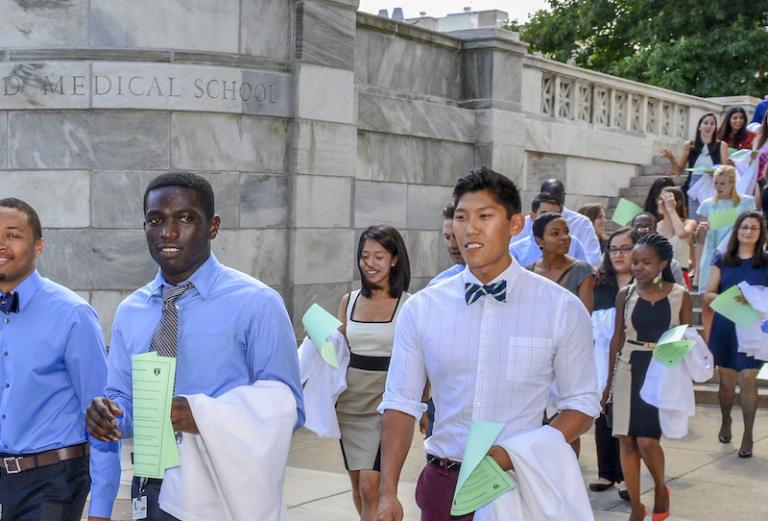 new medical students walking to their dorm