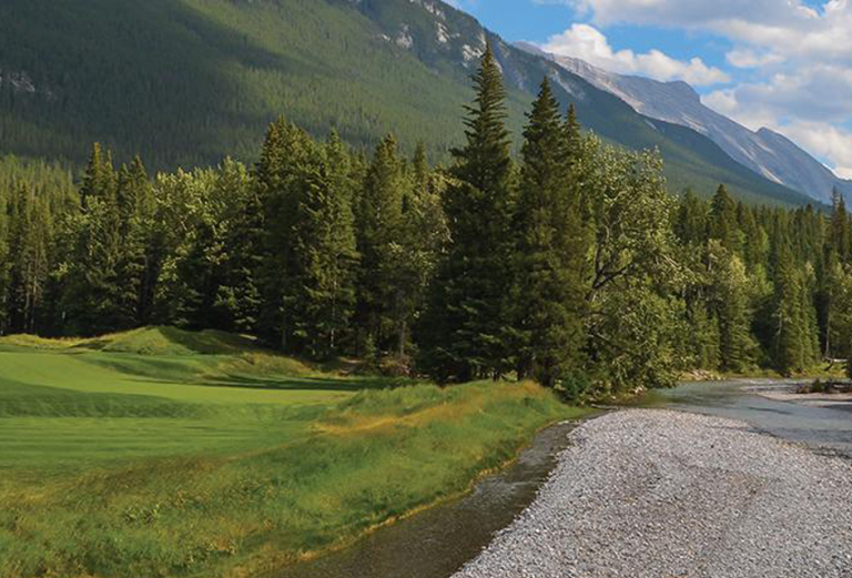 green golf course in the mountains