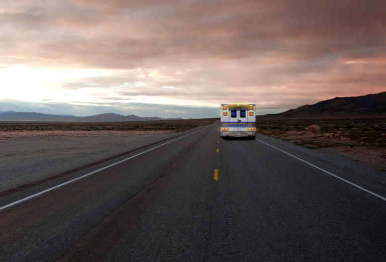 Ambulance photographed on an isolated road