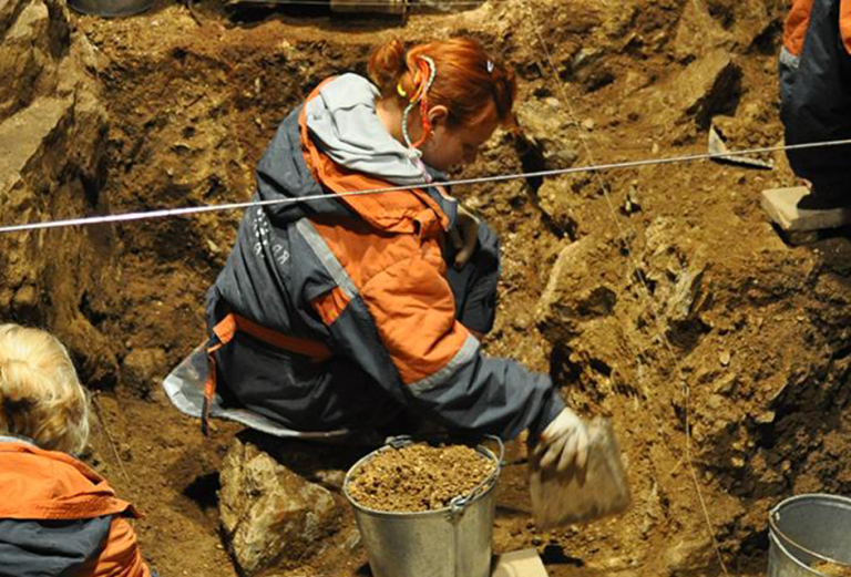 woman digging in a hole