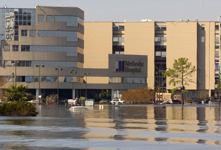 A hospital is partially submerged in floodwater after a natural disaster.
