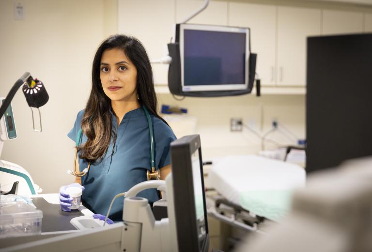 Trisha Pasricha stands in a hospital room