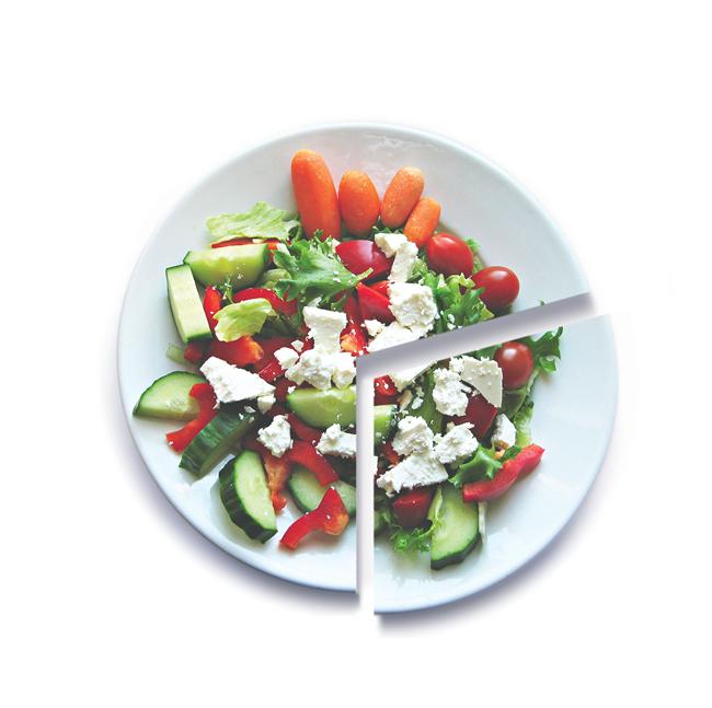 Overhead view of dinner plate with healthy salad