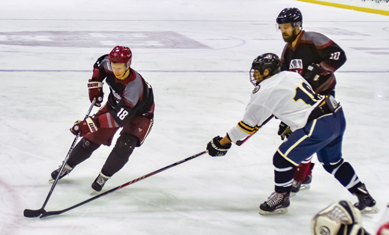 Mike Seward (left) on ice