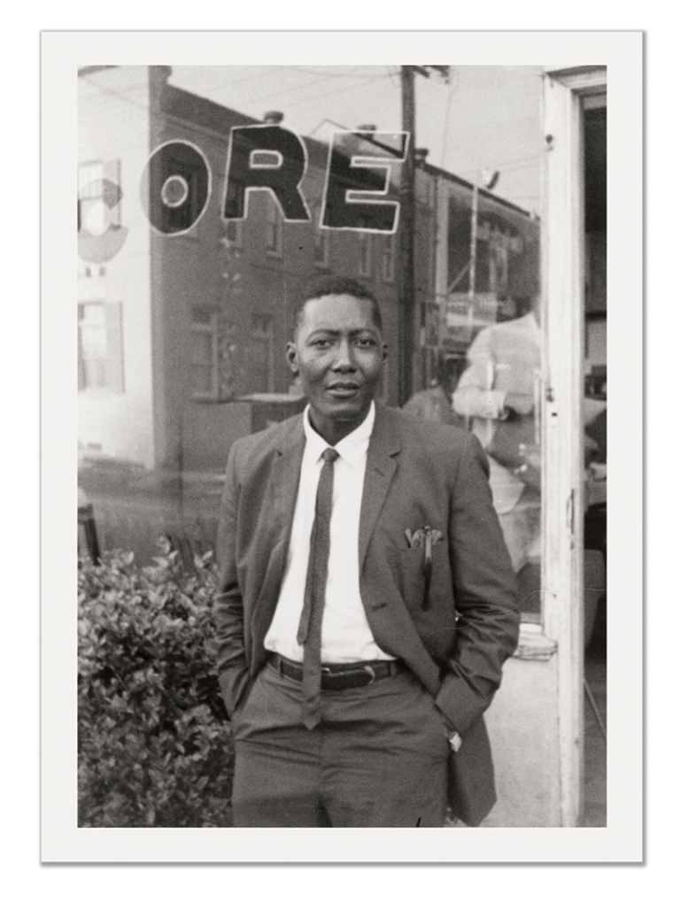 Bob Hicks standing in front of the CORE office in New Orleans in the mid 1960s