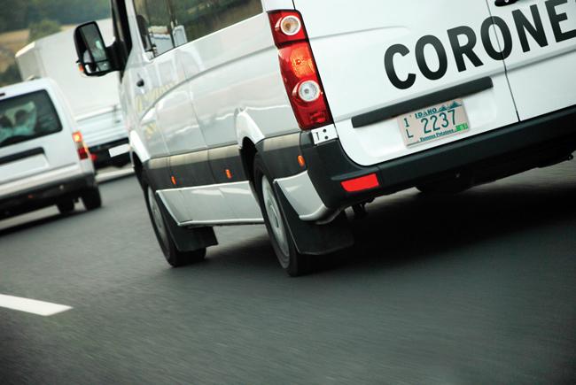 the back of a white van with the word coroner on it