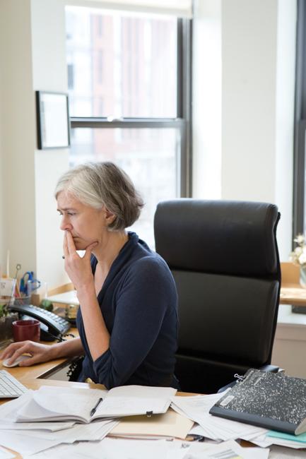 woman sitting at computer desk