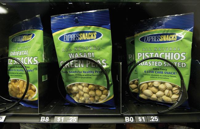 bags of nuts in a vending machine
