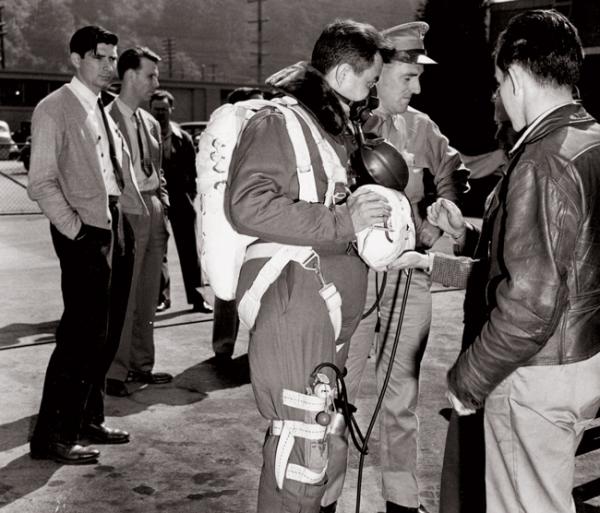 Unable to convince others of the merit of his high-altitude survival apparatus, William Lovelace tested it himself (center, in flight suit).