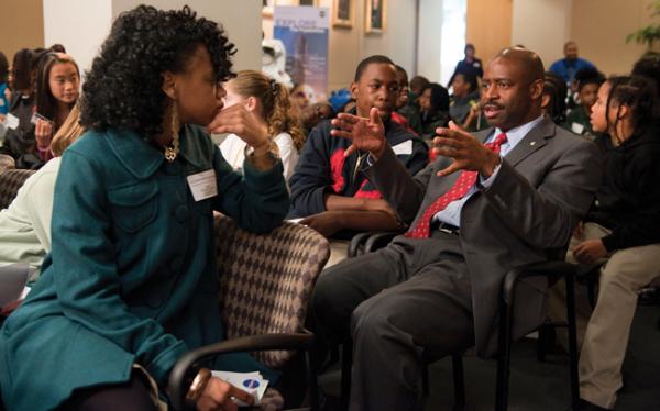 GUIDANCE SYSTEMS: Leland Melvin, former astronaut, now NASA associate administrator for education, sits amid schoolchildren. Programs that bring astronauts to schools across the country are pivotal to NASA’s outreach to young people.