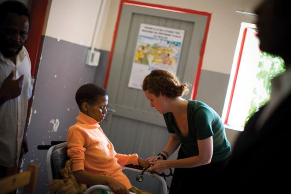 Physician Jennifer Furin tends to a patient in Nohana.